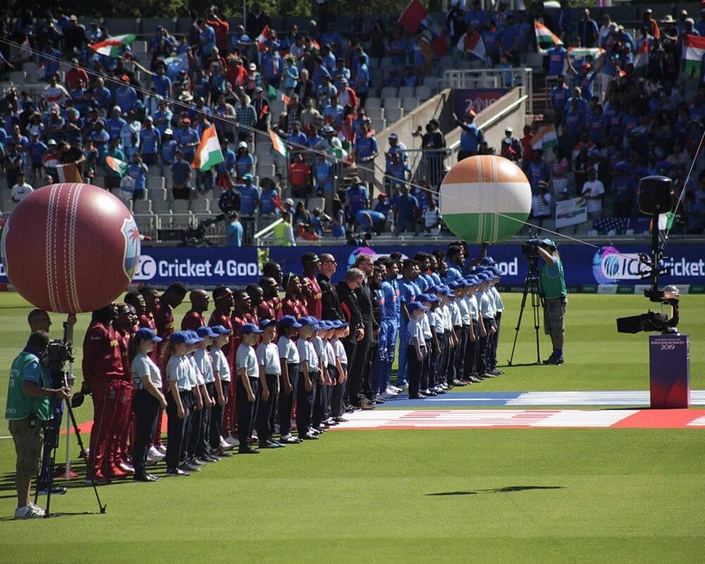A photo of the West Indian and Indian cricket sides lined up for their national anthems, prior to a match at the ICC Men's Cricket World Cup 2019