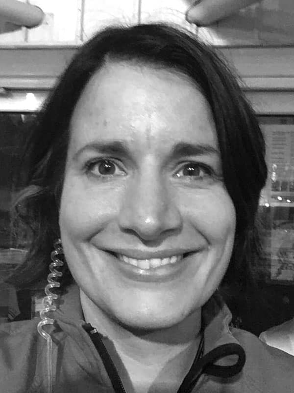 A black and white photo of Abigail Coyle of Red Sky at Night Events