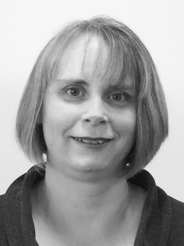 A black and white photo of Dianne Kirk of Red Sky at Night Events