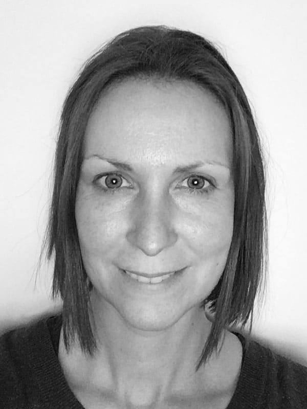 A black and white photo of Felicity Adrian of Red Sky at Night Events