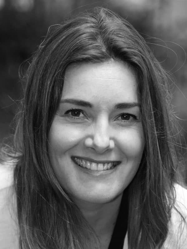 A black and white photo of Karen Schultz of Red Sky at Night Events