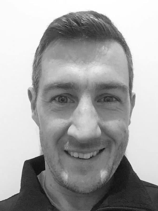 A black and white photo of Martin Allen of Red Sky at Night Events